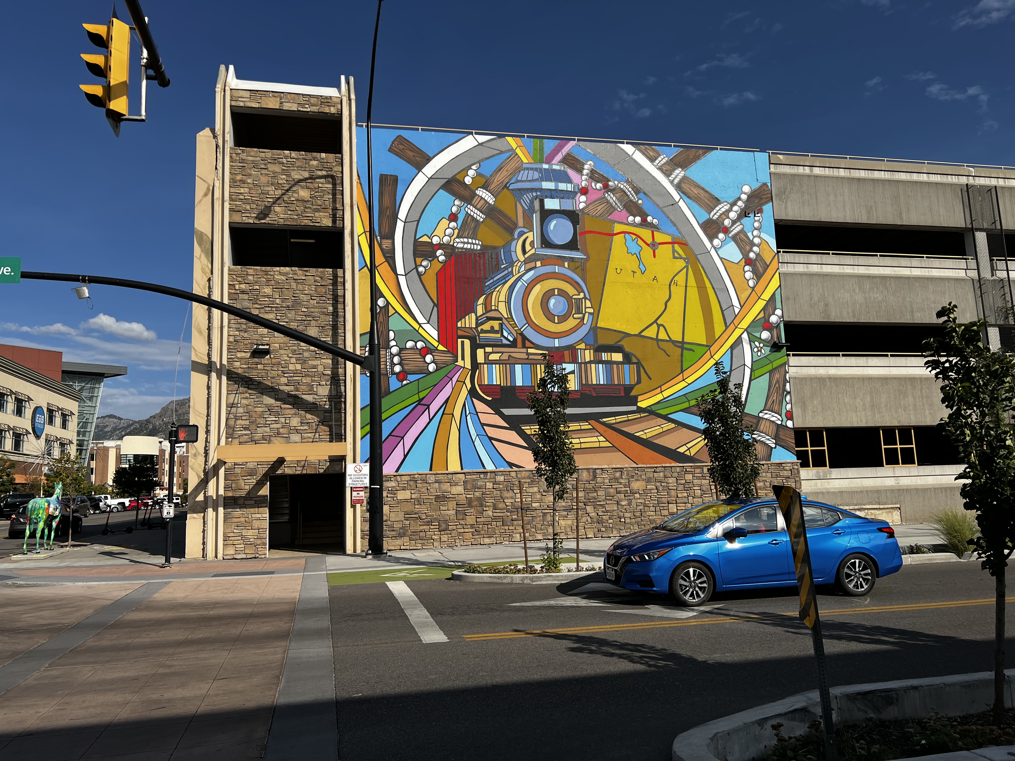 photo of mural and car in the rich contrast photographic style