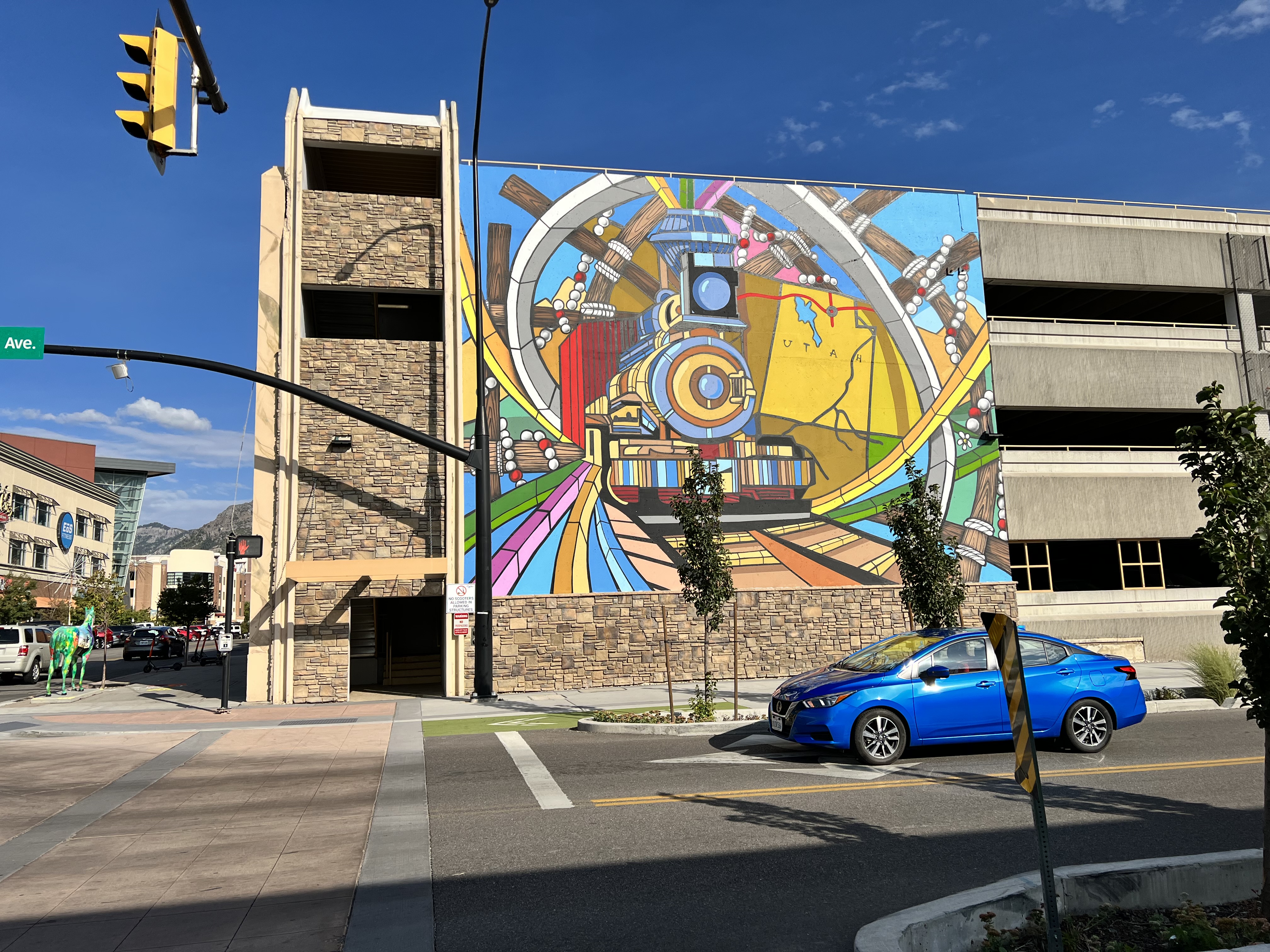 photo of a mural and car in the vibrant photographic style
